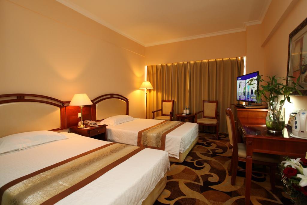 Milky Way Hotel Harbin Habitación foto