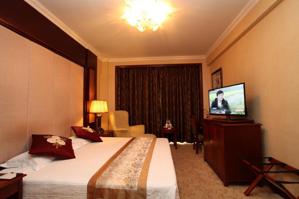 Milky Way Hotel Harbin Habitación foto