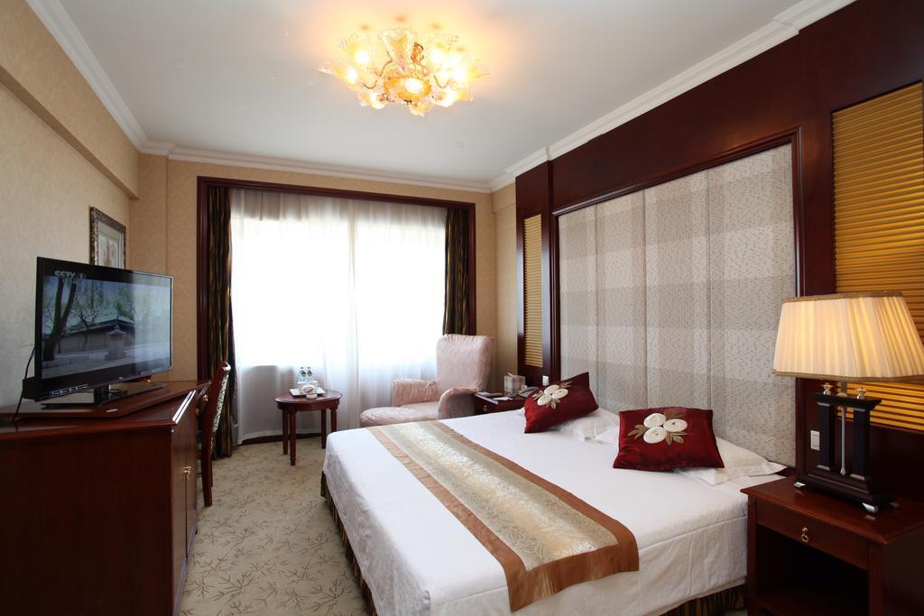 Milky Way Hotel Harbin Habitación foto